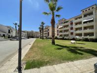 prachtige 2 slaapkamer 2 badkamer begane grond apartement in gesloten urbanisatie met parking en zwembad in Playa flamenca