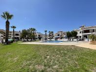 east facing ground floor 2 bed 2 bath apartment in gated community with pool and parking in Playa flamenca