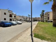 prachtige 2 slaapkamer 2 badkamer begane grond apartement in gesloten urbanisatie met parking en zwembad in Playa flamenca