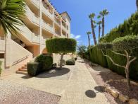 prachtige 2 slaapkamer 2 badkamer begane grond apartement in gesloten urbanisatie met parking en zwembad in Playa flamenca