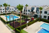  2 bed 2 bath corner top floor apartment overlooking the community pool in pilar de la horadada