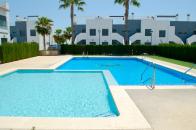  2 bed 2 bath corner top floor apartment overlooking the community pool in pilar de la horadada