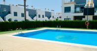  2 bed 2 bath corner top floor apartment overlooking the community pool in pilar de la horadada