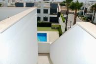  2 bed 2 bath corner top floor apartment overlooking the community pool in pilar de la horadada