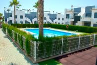  2 bed 2 bath corner top floor apartment overlooking the community pool in pilar de la horadada