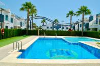  2 bed 2 bath corner top floor apartment overlooking the community pool in pilar de la horadada