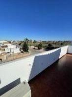 2 bed 2 bath east facing corner top floor apartment in Punta Prima