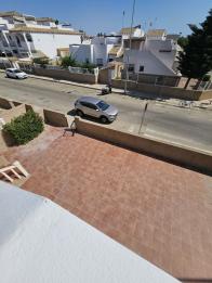 2 bed 2 bath east facing corner top floor apartment in Punta Prima