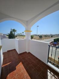 2 bed 2 bath east facing corner top floor apartment in Punta Prima