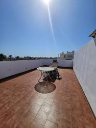 2 bed 2 bath east facing corner top floor apartment in Punta Prima