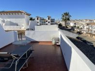 2 bed 2 bath east facing corner top floor apartment in Punta Prima